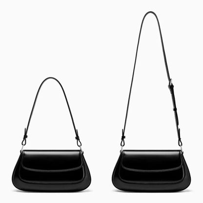 Aurora leather handbag — strap detail for crossbody wear
