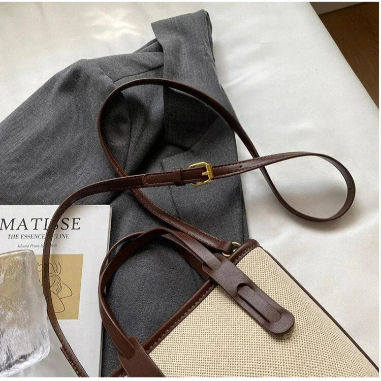 Worn crossbody — hands-free canvas & faux leather tote
