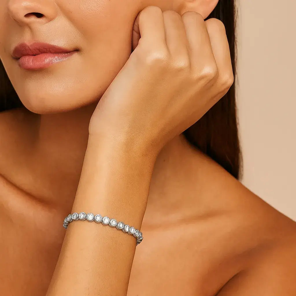 light-skinned brunette model wearing Elegantia silver tennis bracelet