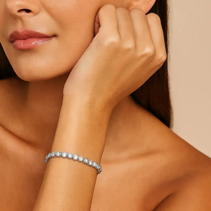 light-skinned brunette model wearing Elegantia silver tennis bracelet