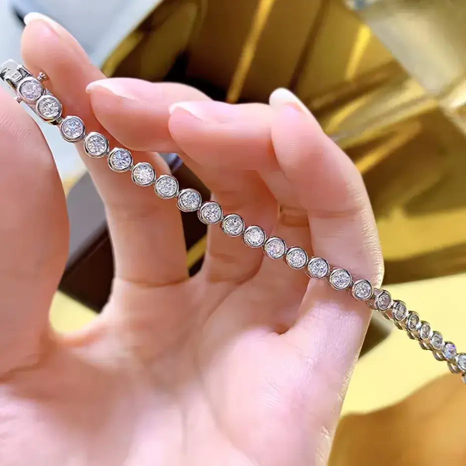 elegant silver tennis bracelet on wrist – minimal luxury look