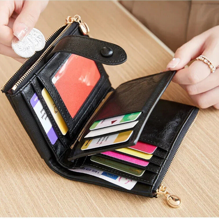Black tri-fold leather wallet with coin pocket