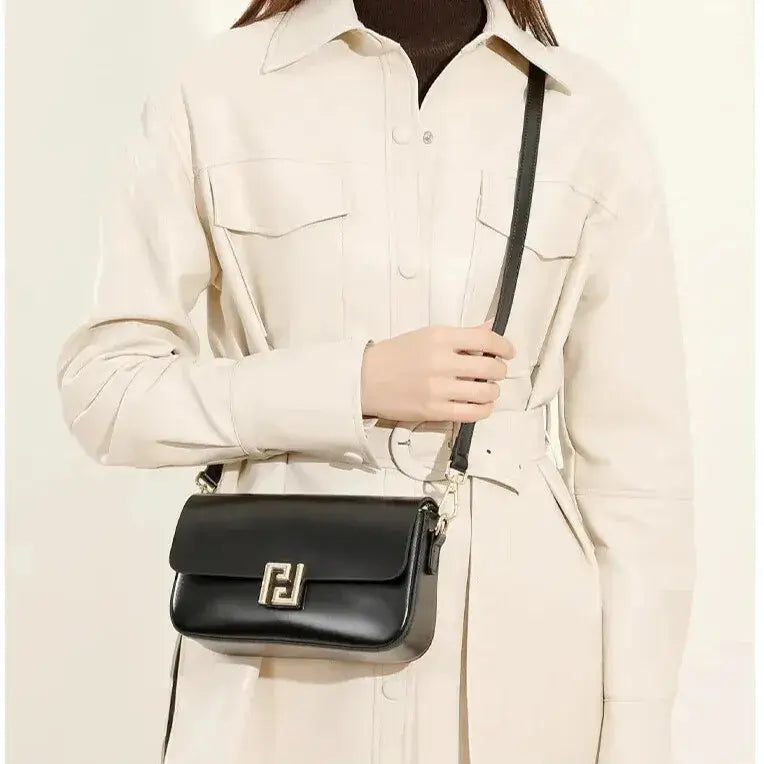structured square shape of black leather crossbody bag