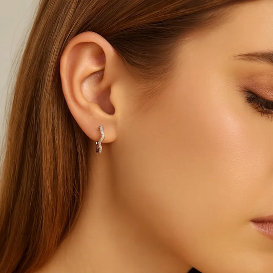 minimalist silver wave hoops everyday styling