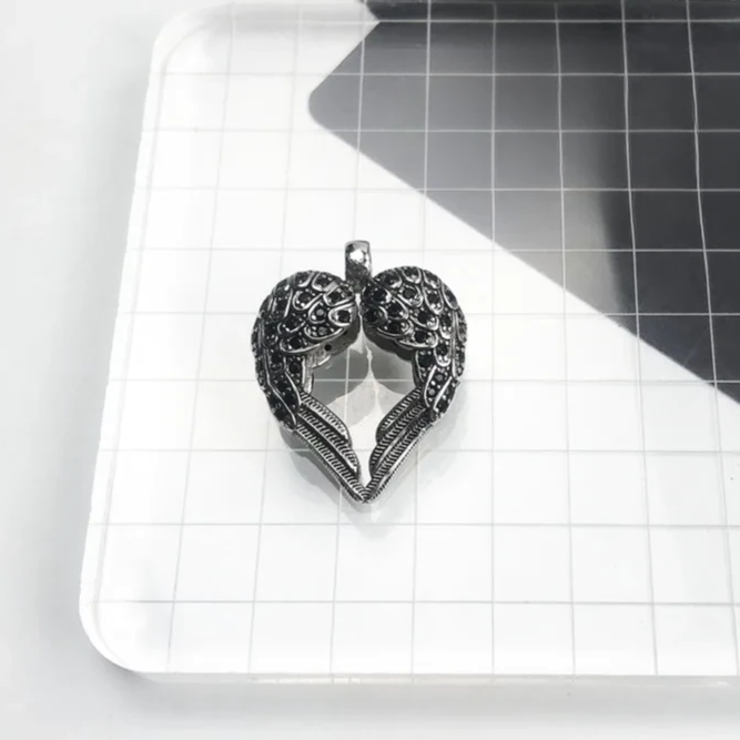 Lifestyle shot — women’s sterling silver winged heart jewellery