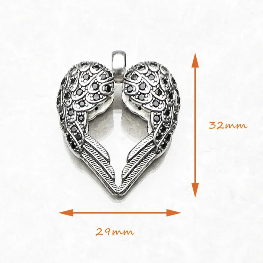 delicate silver winged heart jewellery size