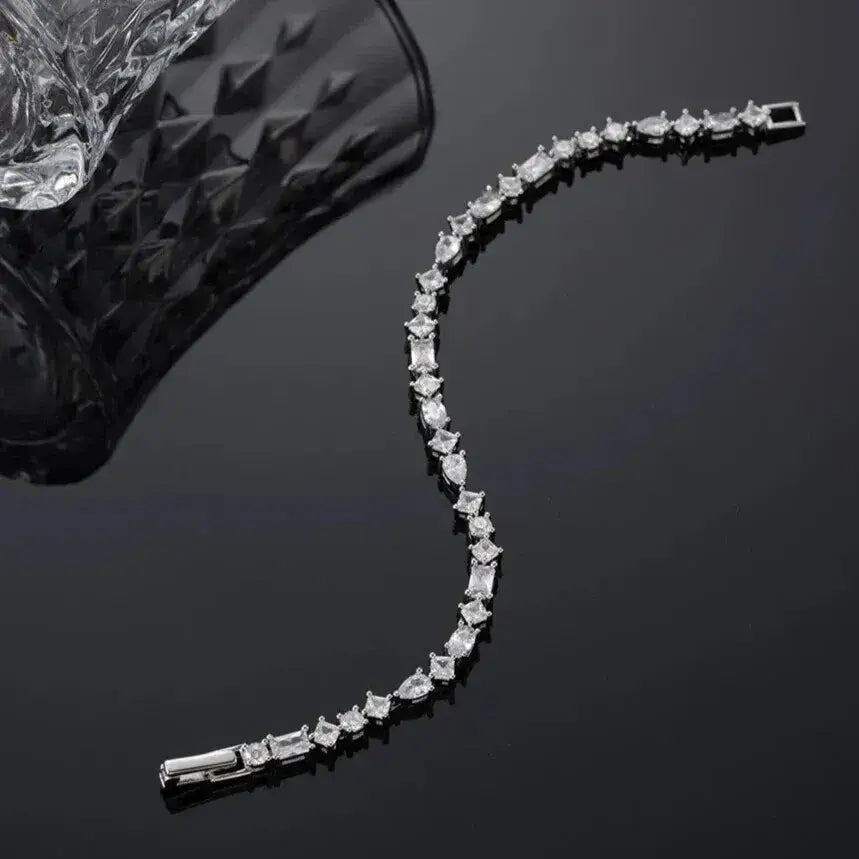 luxury silver tennis bracelet with mixed-cut stones-Elegantia