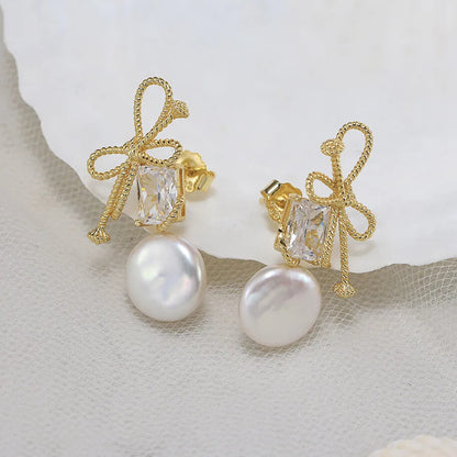 womens vintage pearl drop earrings in sterling silver with natural baroque pearl