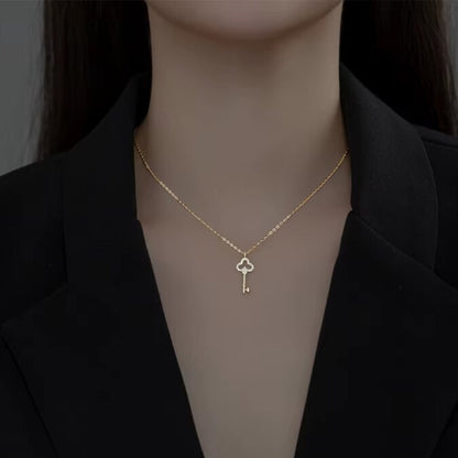 dainty collarbone chain necklace with clover key pendant gold plated