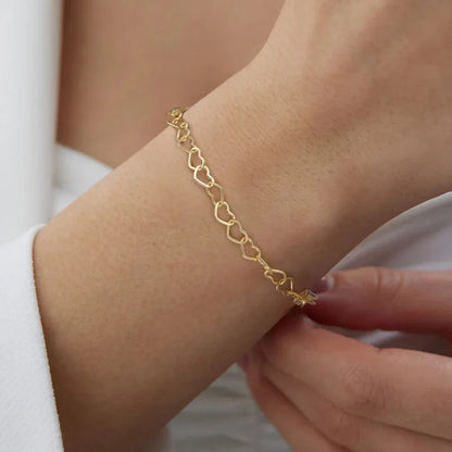 women’s heart chain bracelet in silver and gold