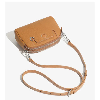 Side profile — slim, structured vintage leather handbag
