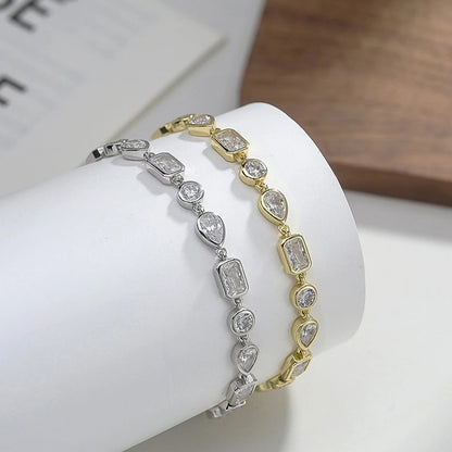 Close-up of square, oval and teardrop zircon tennis bracelet